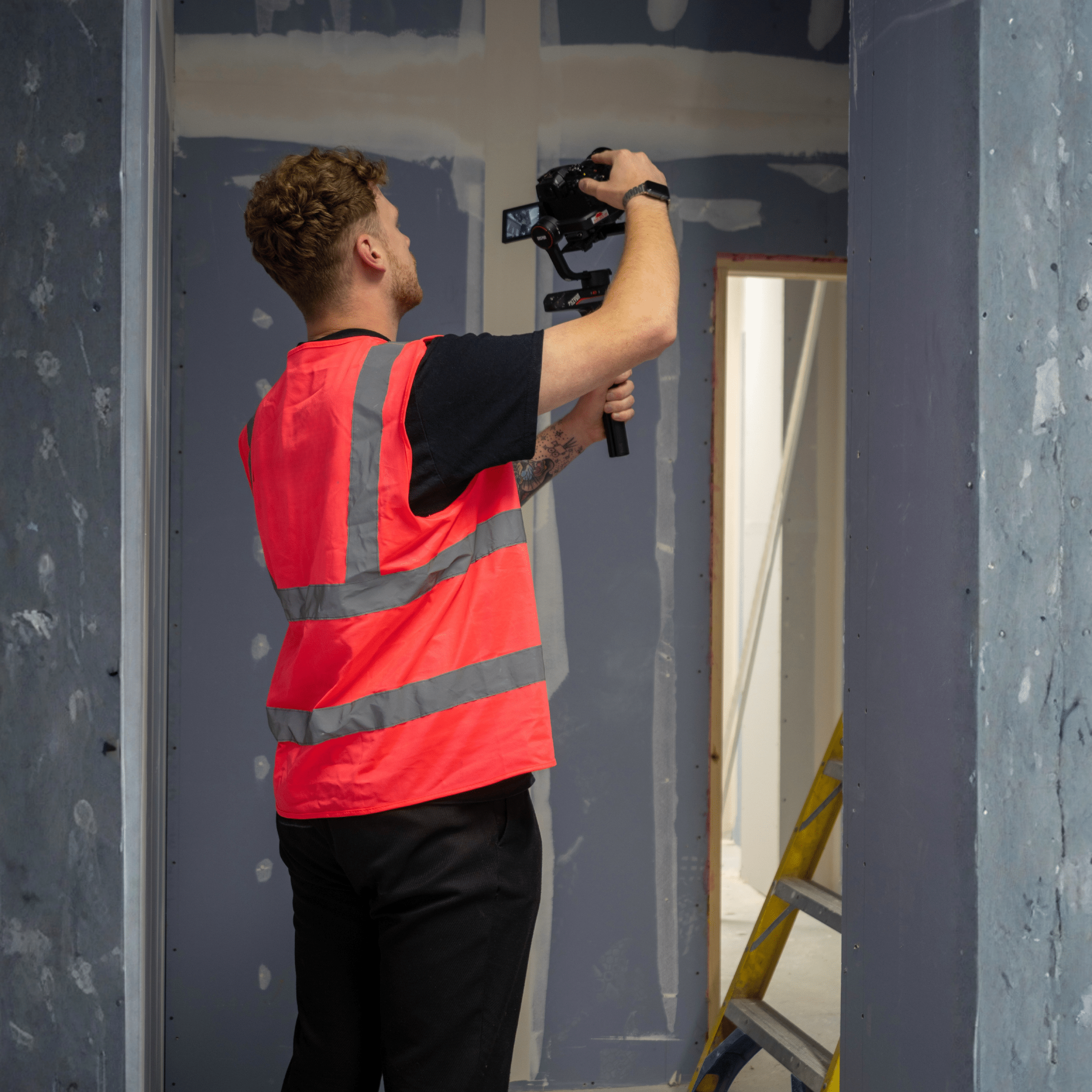 Videographer filming on site for a micro content package