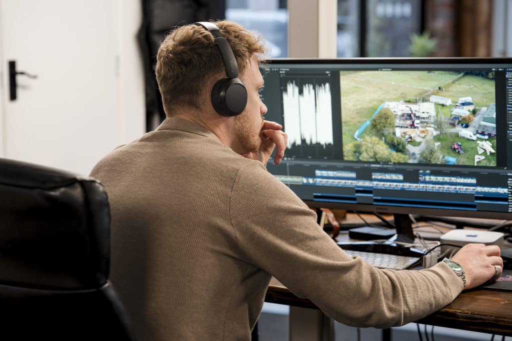 Video editor reviewing client footage for micro-content services